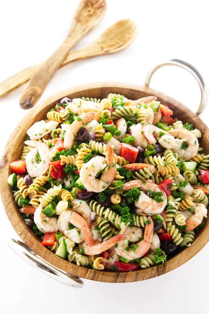 Large salad bowl filled with a pasta salad with shrimp