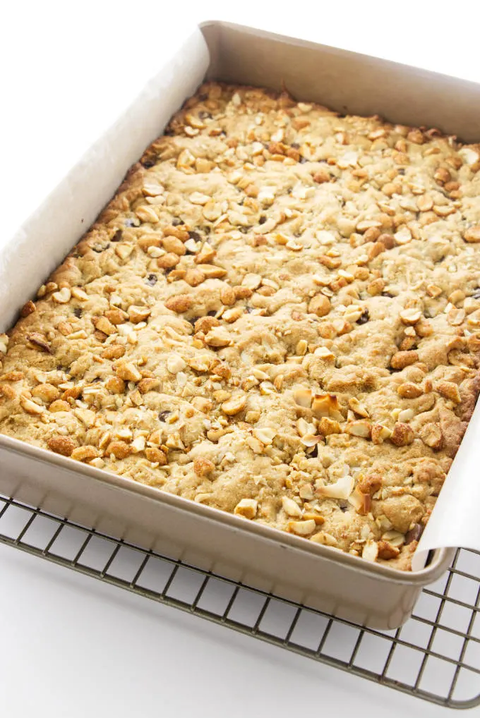 A pan of peanut butter coconut bars fresh out of the oven.