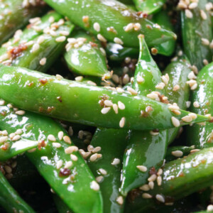 Sesame snap peas with toasted sesame seeds.