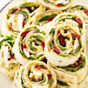 Vegetarian Mediterranean pinwheels on a plate.