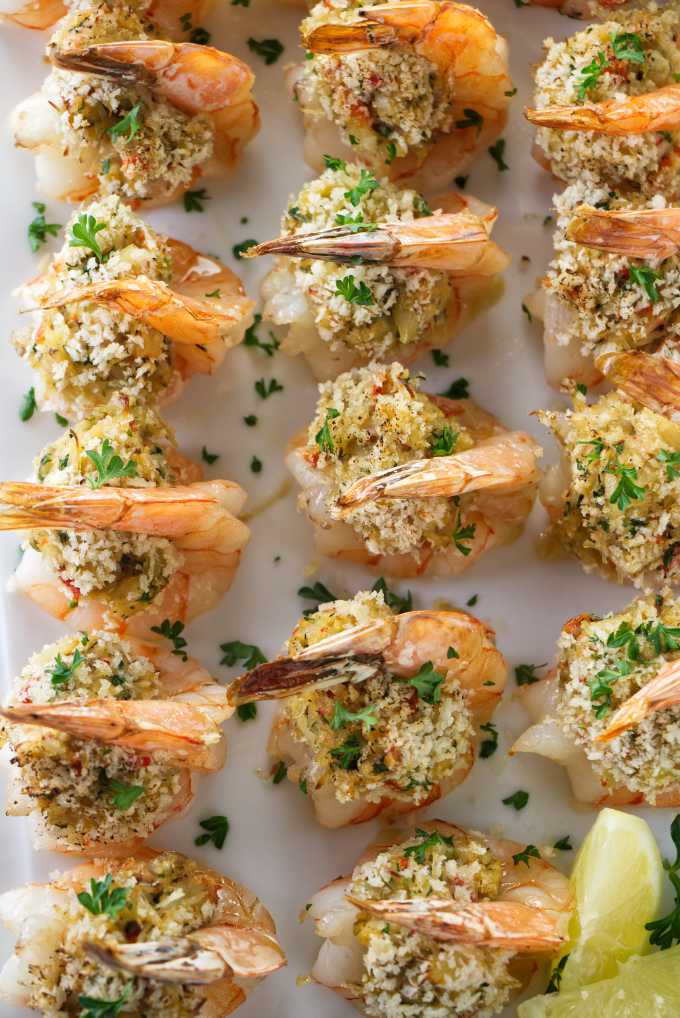 An overhead shot of crab stuffed shrimp on a plate.