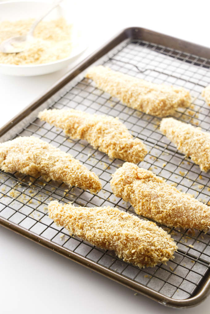 Breaded chicken tenderloins ready to bake