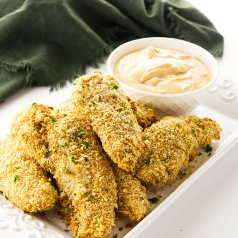 Crispy Oven Baked Chicken Tenders appetizers with a chipotle aioli dip
