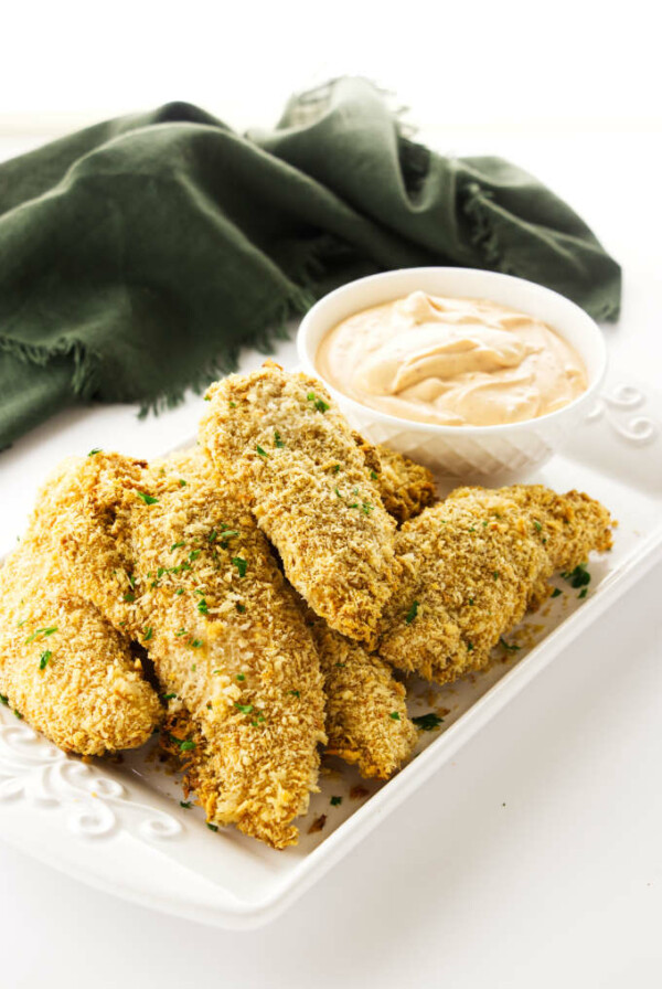 Crispy Oven Baked Chicken Tenders appetizers with a chipotle aioli dip