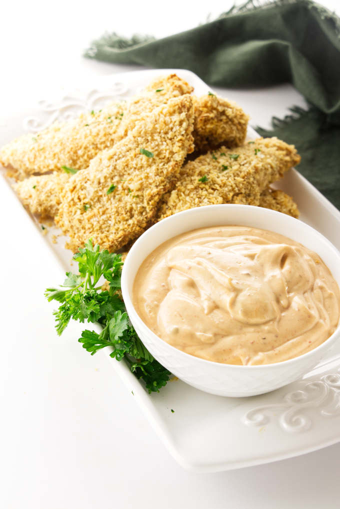 Appetizers of Panko breaded chicken tenders and a dish of chipotle aioli