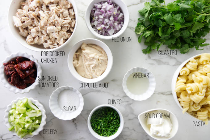 Ingredients needed to make chicken chipotle pasta salad.