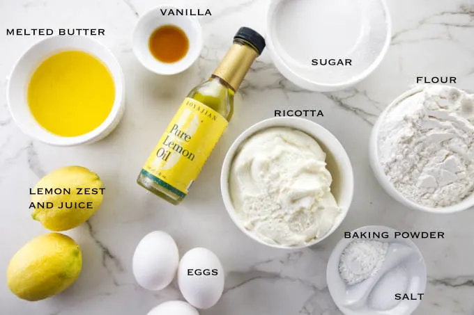 Ingredients needed to make lemon ricotta cake.