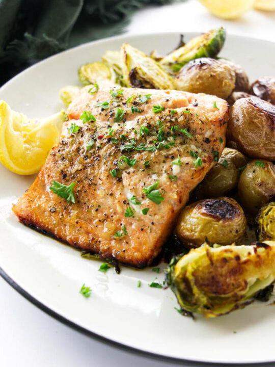 A serving of Sheet Pan Salmon and vegetables