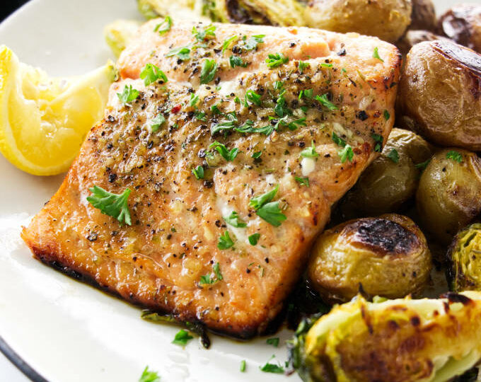 A serving of Sheet Pan Salmon and vegetables