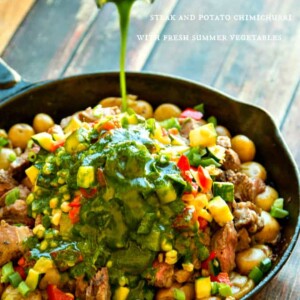 A skillet filled with steak and potatoes.