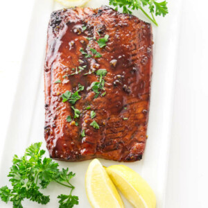 Bourbon glazed salmon on a serving platter.