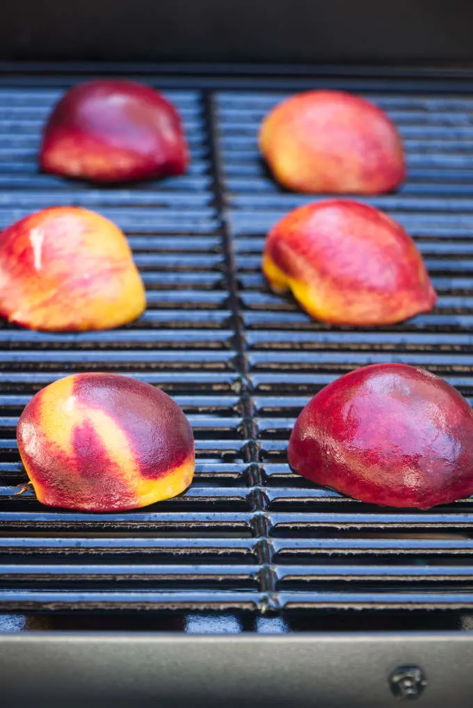 Peaches on a hot grill.