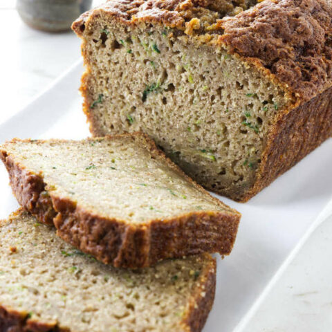 A loaf of zucchini bread made with brown sugar.