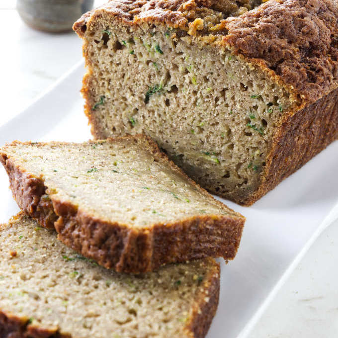 A loaf of zucchini bread made with brown sugar.