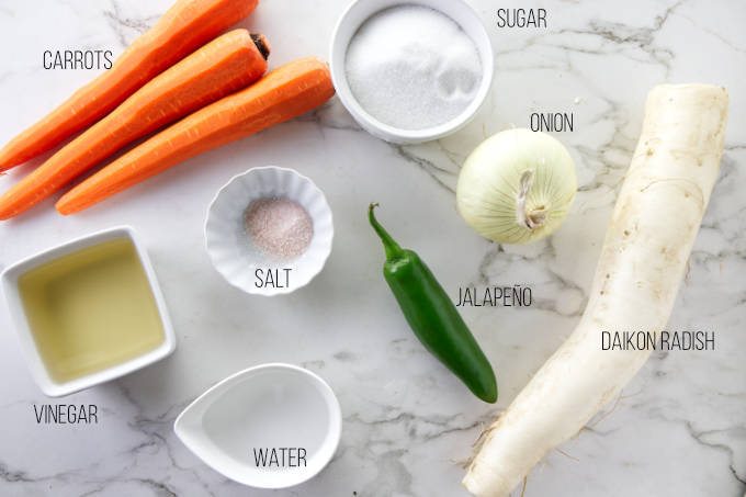 Ingredients used to make pickled vegetables for a chicken meatball banh mi sandwich.
