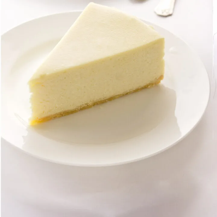 a serving of cheesecake on a dessert plate