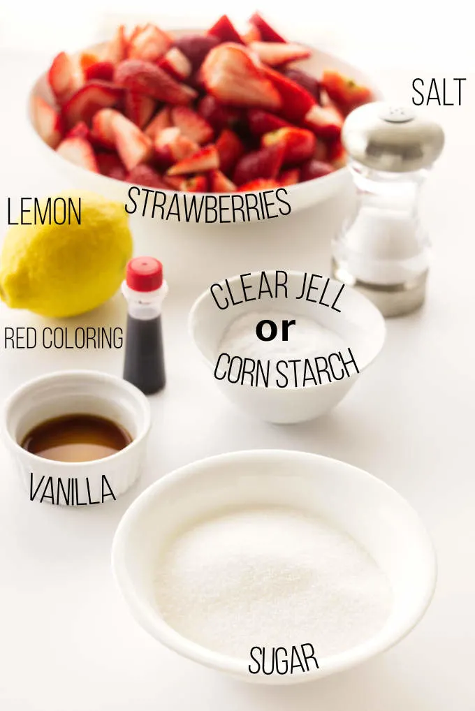 Ingredients used to make strawberry topping for cheesecake.