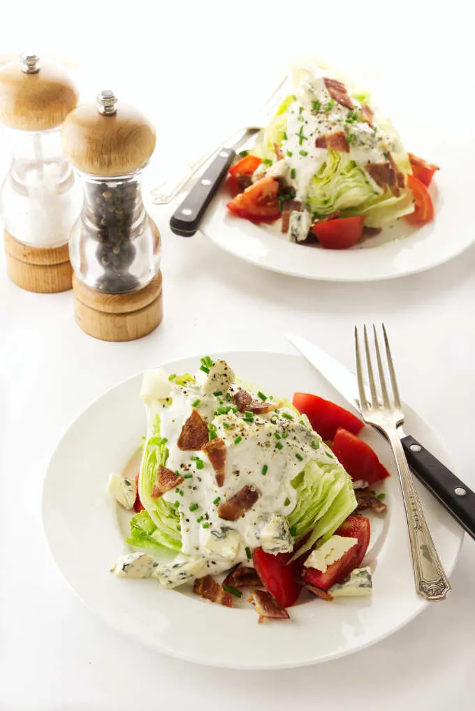 Two serving of classic wedge salad