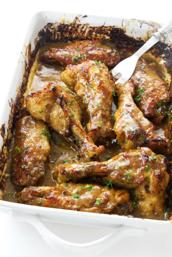 Baked turkey wings in a baking dish.