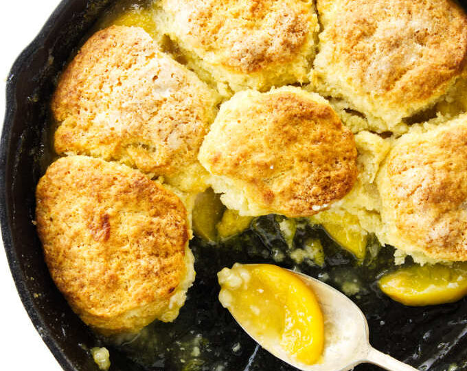 Overhead view of part of thenskillet peach cobbler with