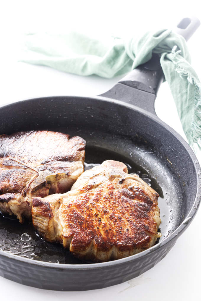 Pork chops in skillet