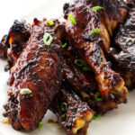 Close up view of sticky teriyaki turkey wings