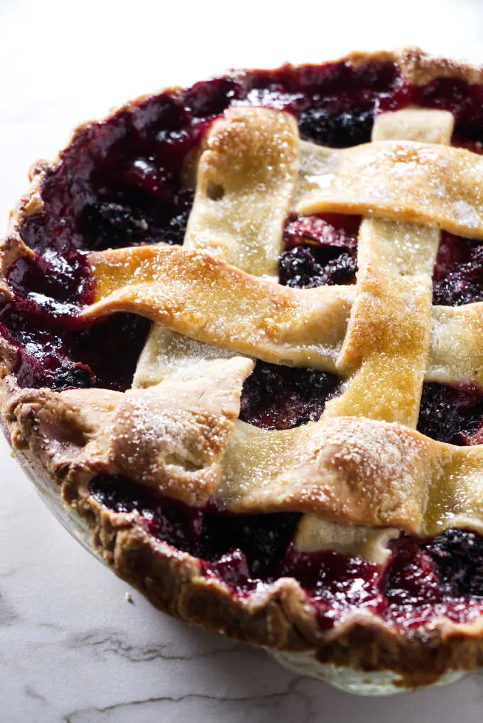 Blackberry peach pie with a lattice top.