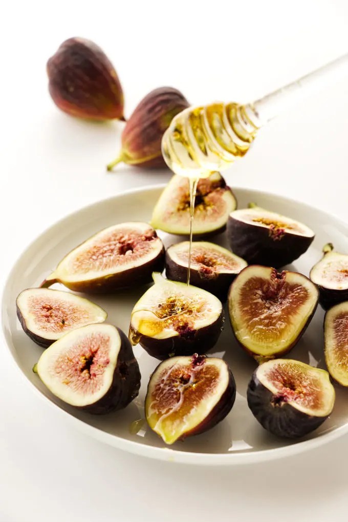 Plate of figs with a drizzle of honey