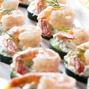 Cucumber shrimp appetizers on a serving platter.