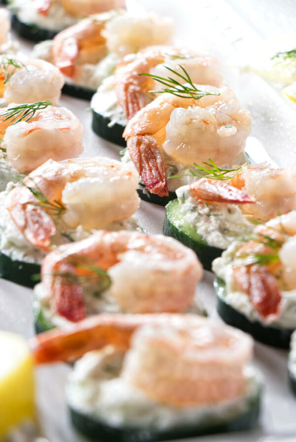 Cucumber shrimp appetizers on a serving platter.