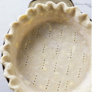 Gluten free pie dough in a pie dish.