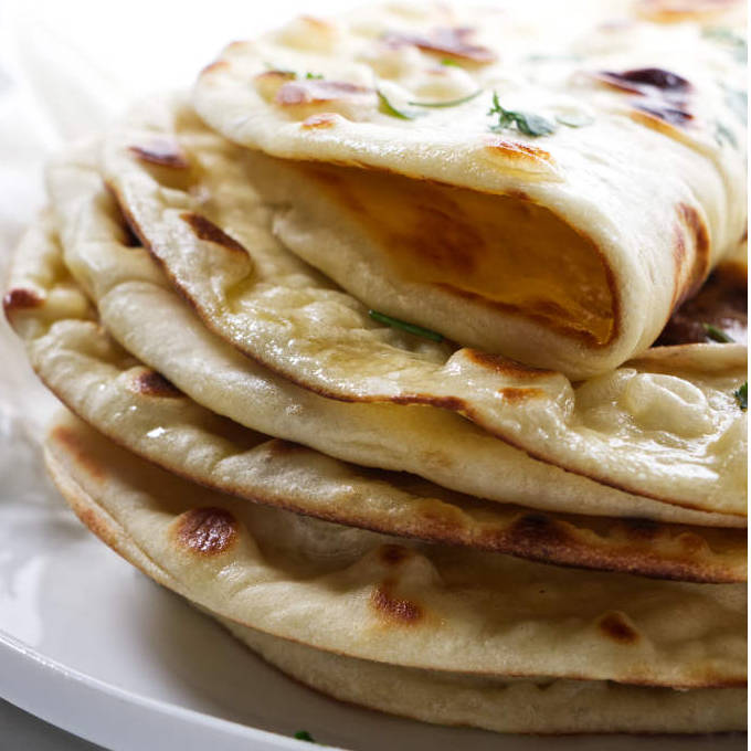 A stack of naan bread.