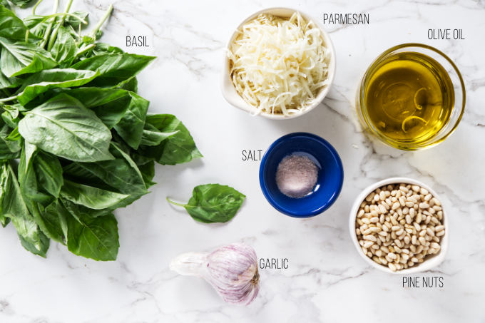 Ingredients used to make basil pesto.