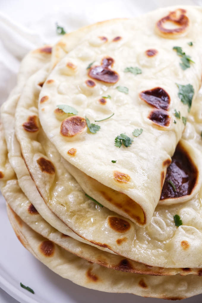 Soft flat bread stacked on top of each other.