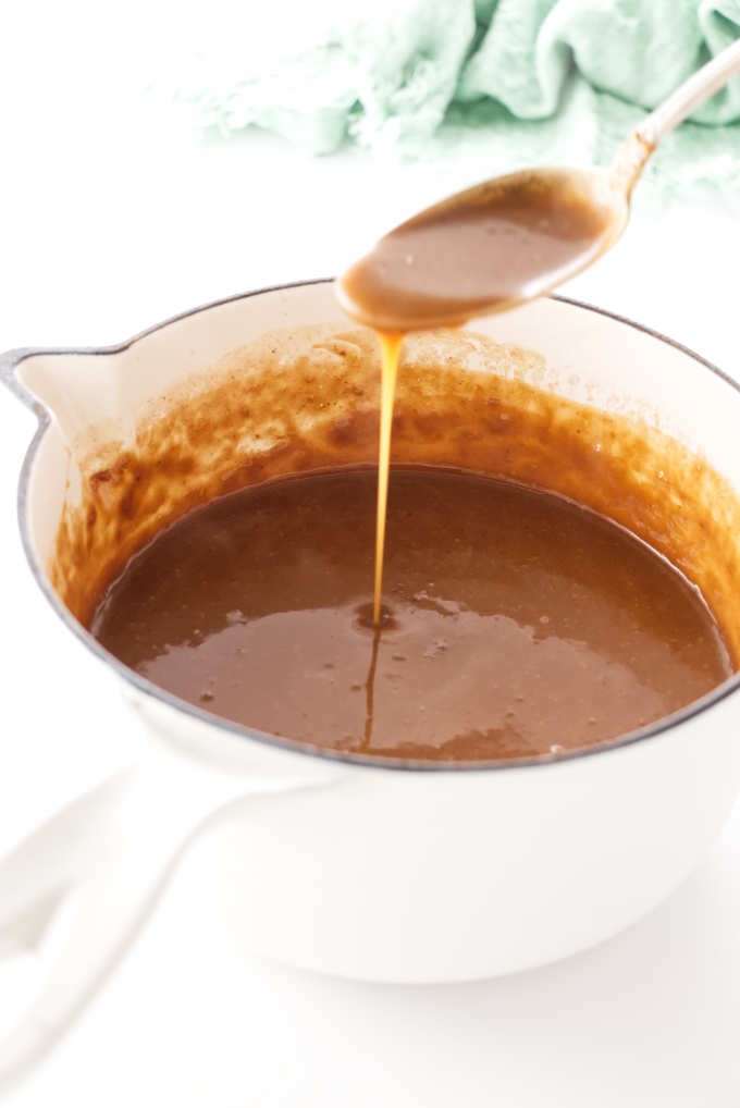Caramel sauce in a saucepan.