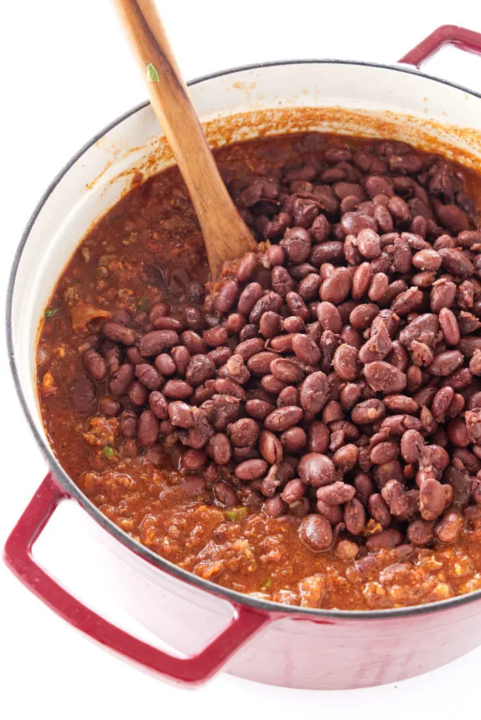 A large pot filled with chili and red beans.