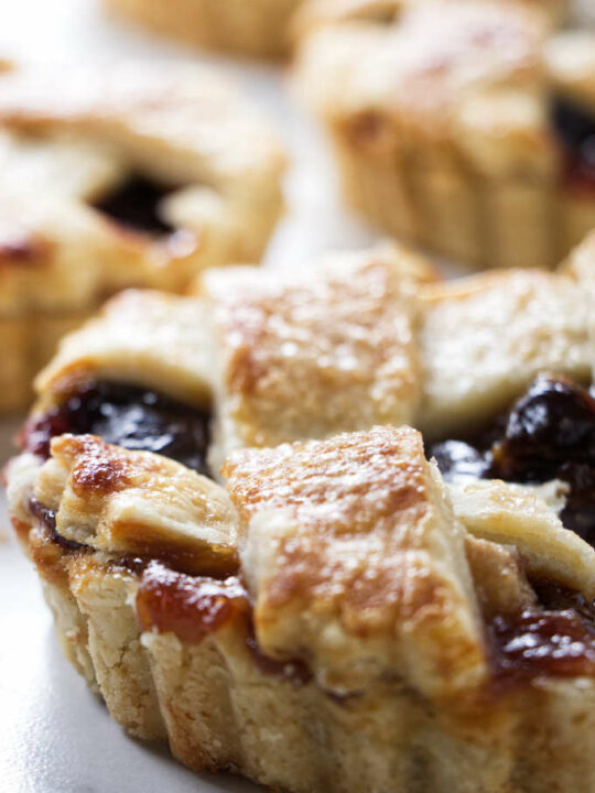 A 6-inch tart filled with dried cherries and fresh pears.