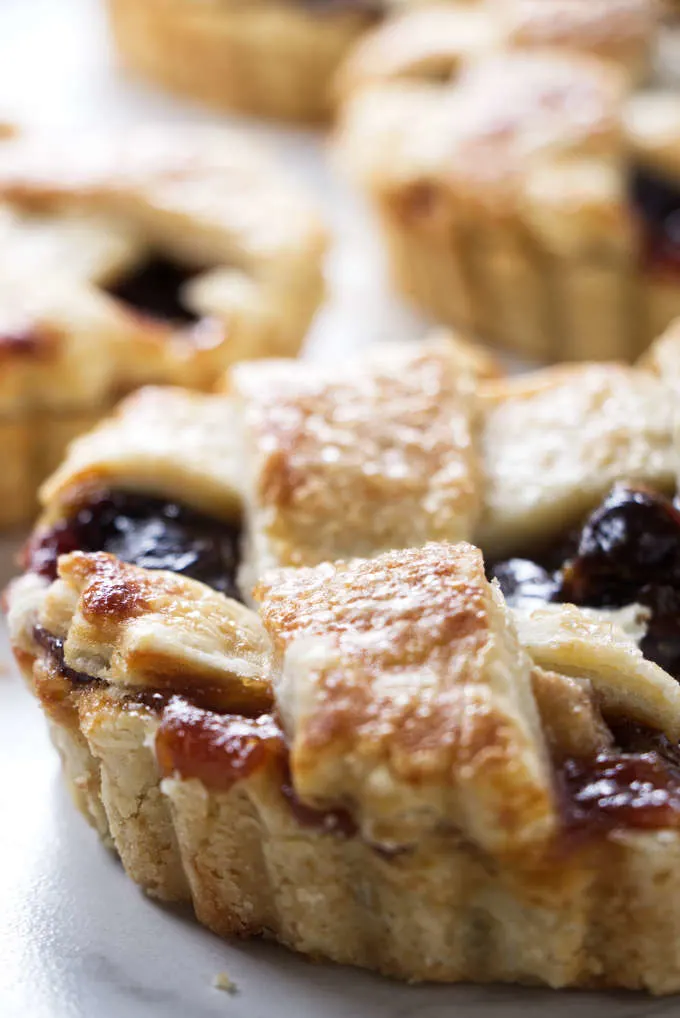 A 6-inch tart filled with dried cherries and fresh pears.