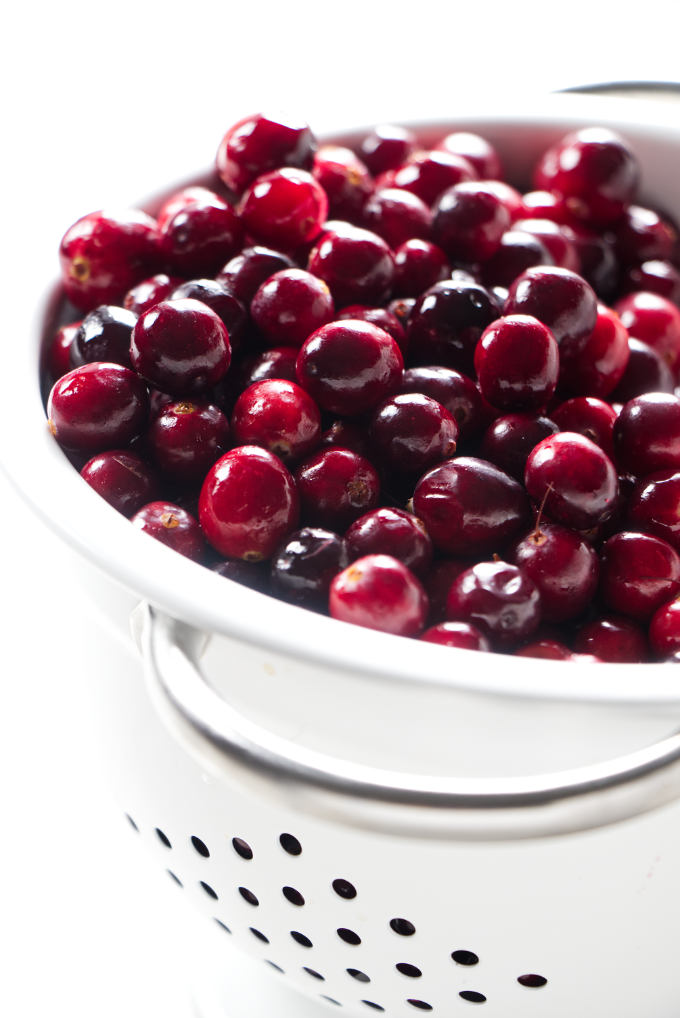 Fresh cranberries in a colander.