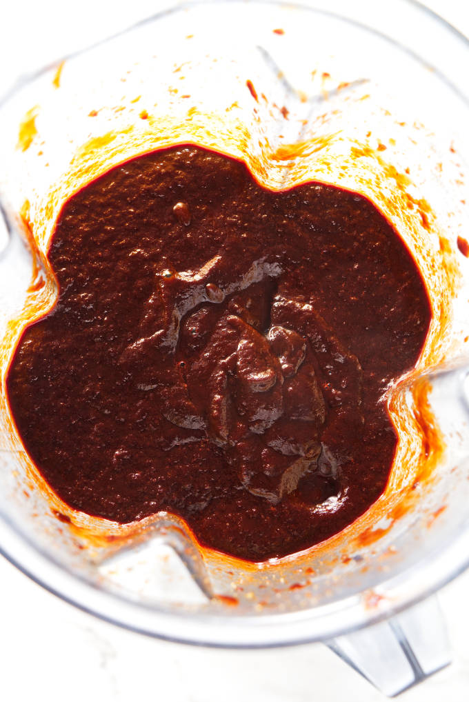 Red chile sauce in a blender.