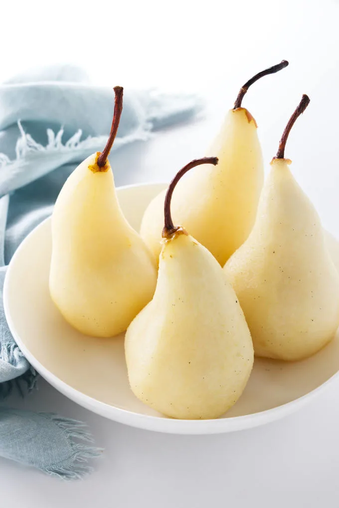 Four White Wine Poached Pears in a dish
