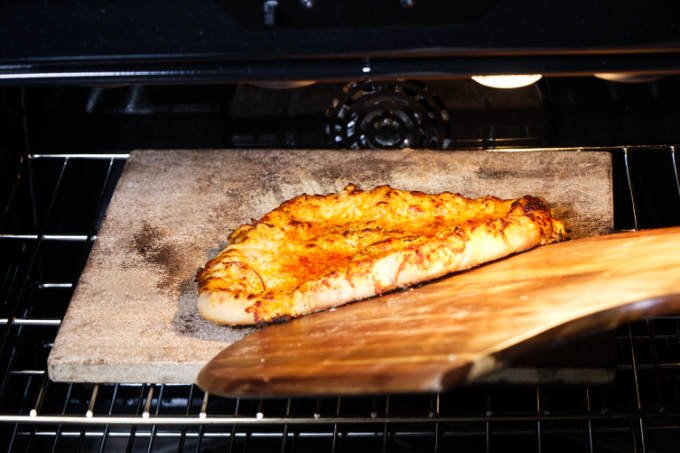 Cooking a pizza in a standard oven.