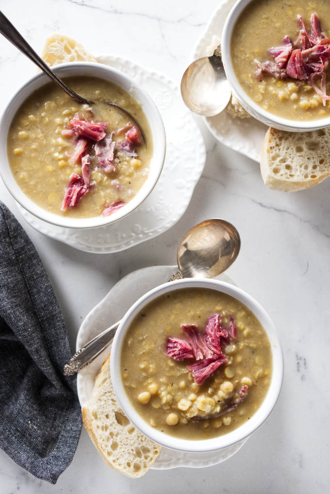 Three bowls of Swedish yellow pea soup.