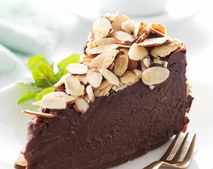 Close up of a slice of chocolate truffle cake