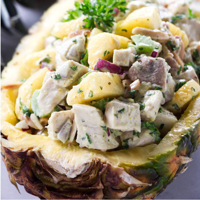 Chicken salad in a pineapple bowl.