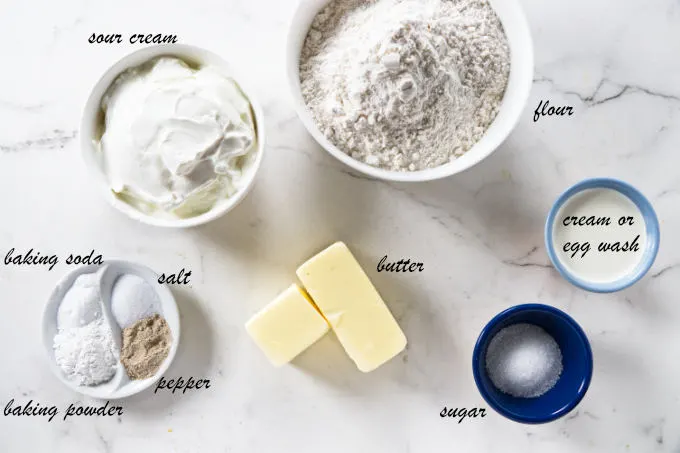 Ingredients needed to make sour cream biscuits.