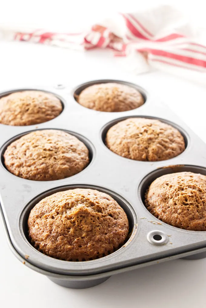 six jumbo carrot cake cupcakes in pan