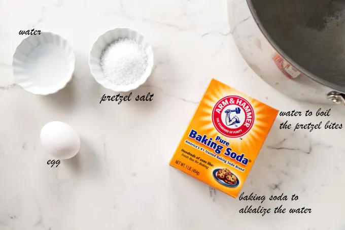 The ingredients used for a baking soda bath and egg wash.
