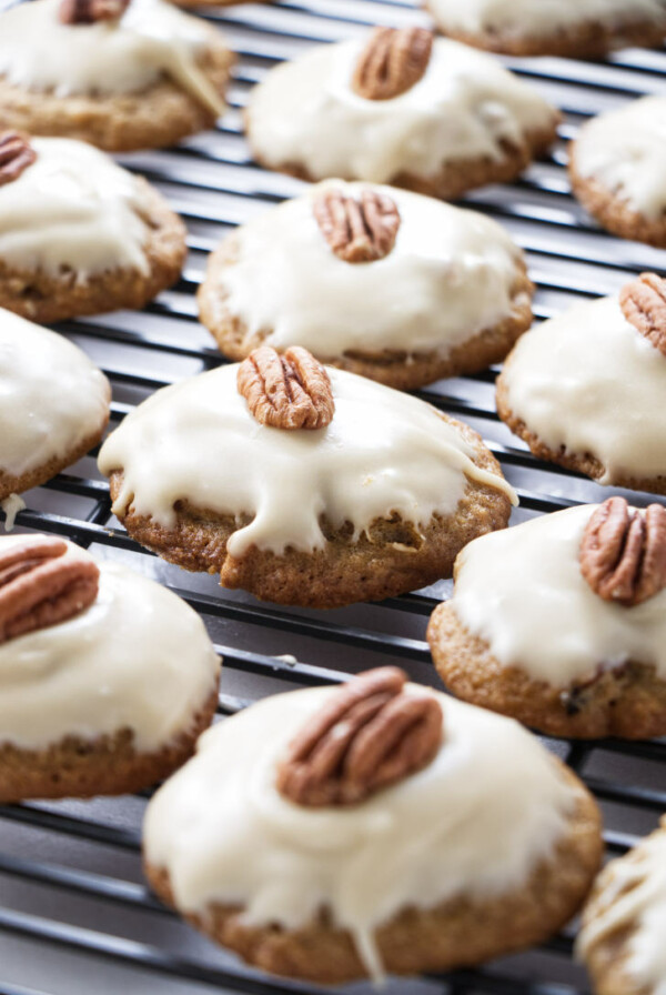 Maple pecan cookies on a cooling rack.