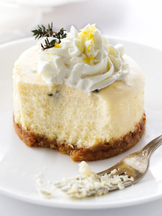 A serving of an individual goat cheese cheesecake